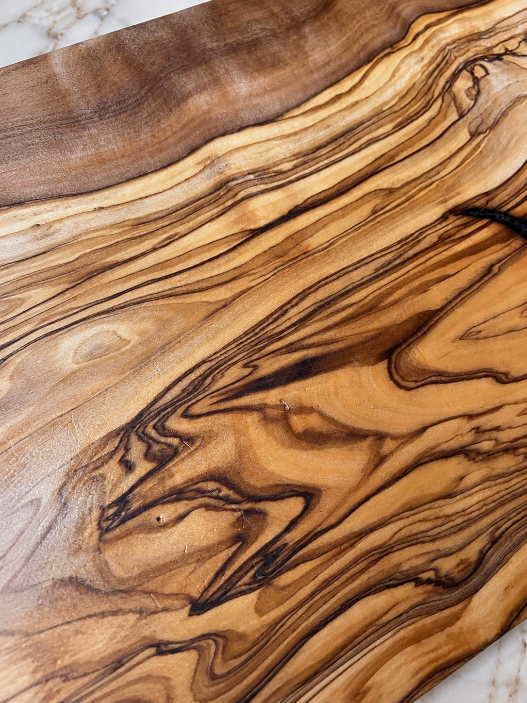 Tagliere "onde" in legno d'ulivo
